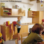 Preview: Herdumbauschrank für Einbauherd für Kindergartenküche in Kinderhöhe